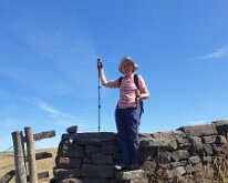 Brenda posing on a step stone stile