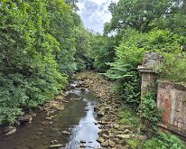 The Murk Esk with remains of a railway bridge