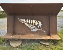 Silver fern leaf formed from soldier silhoutettes, New Zealand Division memorial, Longueval