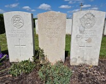 A German grave in between British graves, Longueval Road cemetery