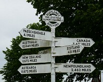 Signpost showing where battalions forming the Scottish Division came from, The 9th (Scottish) Division memorial, Frezenburg ridge