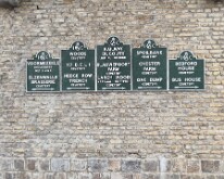 Signposts to multiple cemeteries in and around Ypres