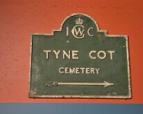 Tyne Cot cemetery sign in the Hooge Crater museum Note the logo of the Imperial War Graves Commission